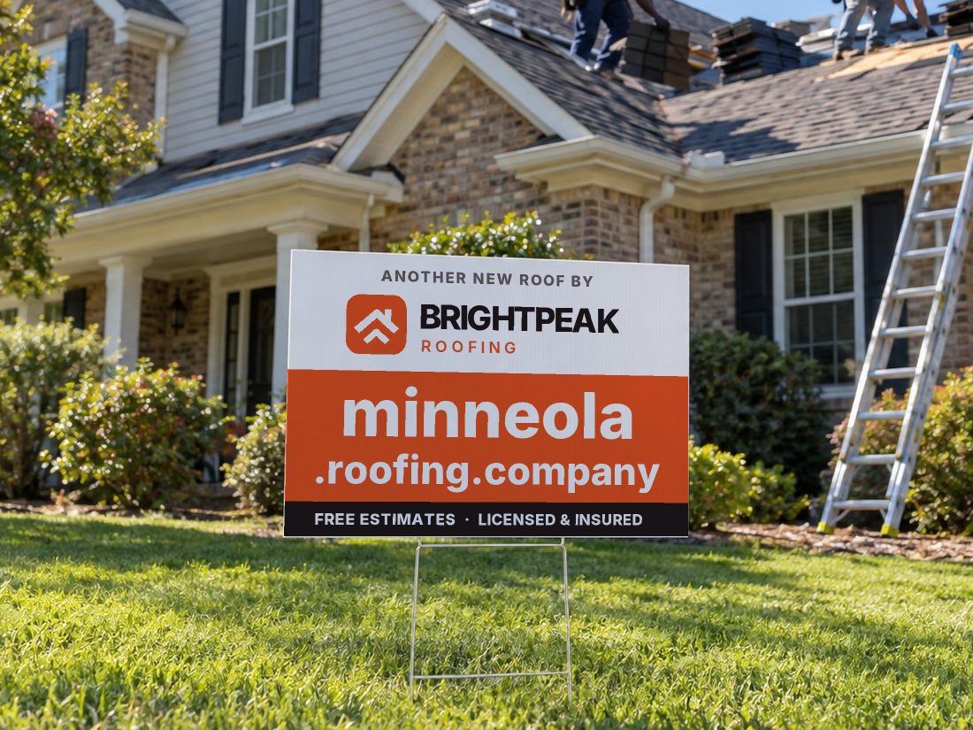 minneola.roofing.company on a yard sign in front of a house getting a new roof
